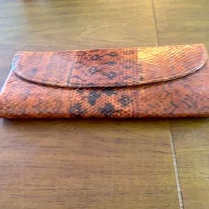 Vintage Snake skin clutch. Never been used.